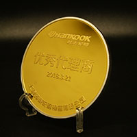 上海韓泰輪胎代理商大會銀鑲金獎章_ 獎章制作 紀念章制作 金銀幣定制 獎牌定制 會議表彰 員工福利